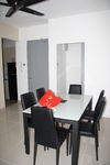 dining table and view of large storage room at the back